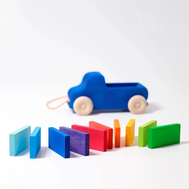 BLUE PULL ALONG TRUCK WITH BLOCKS